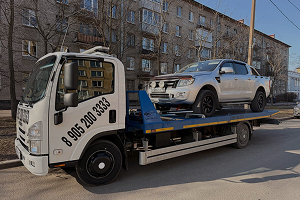 Межгород и перевозка автомобиля по трассе